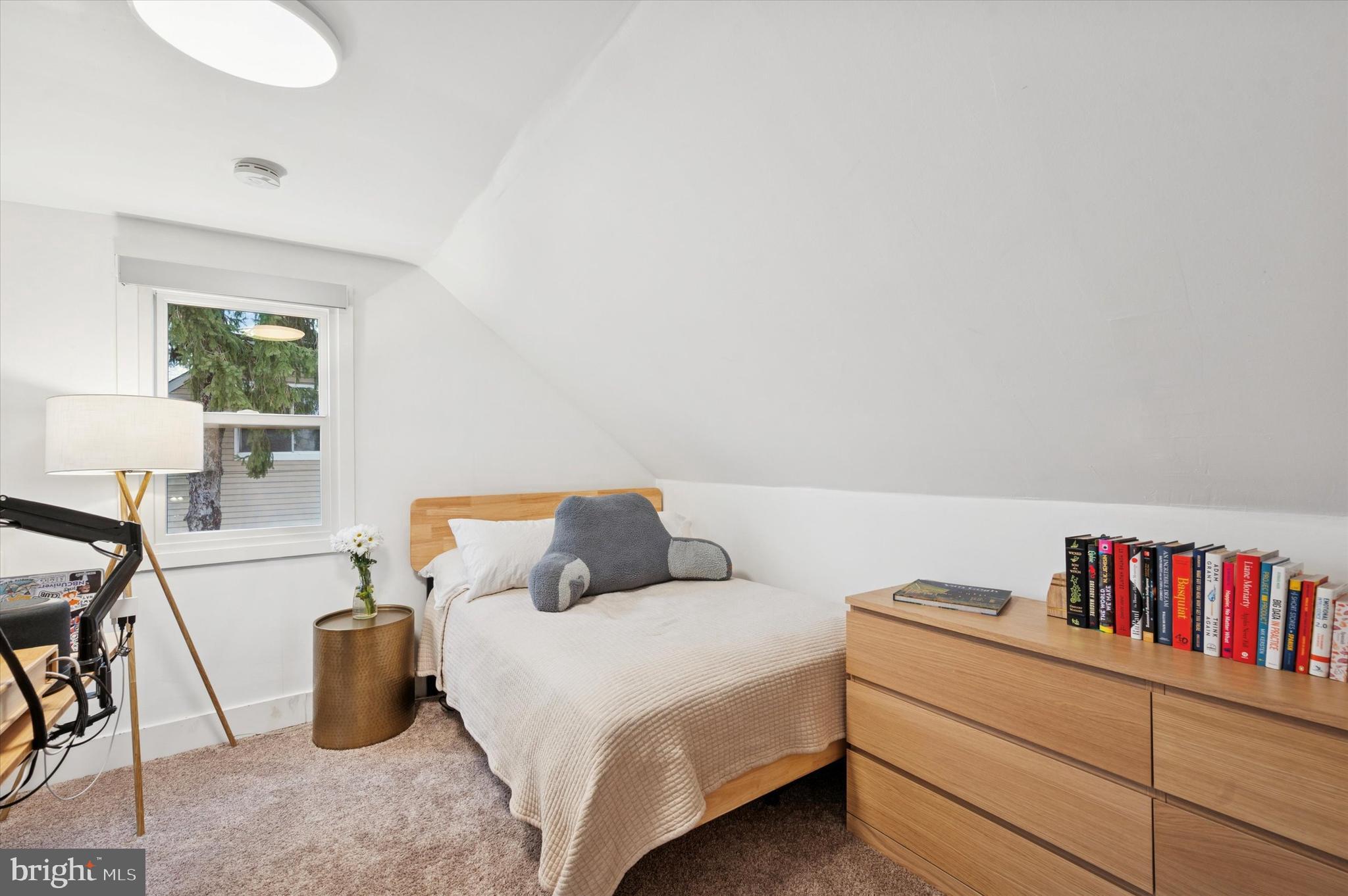 508 5th Avenue Barrington, NJ 08007 - Photo 24 of 28 a living room with furniture and a book shelf
