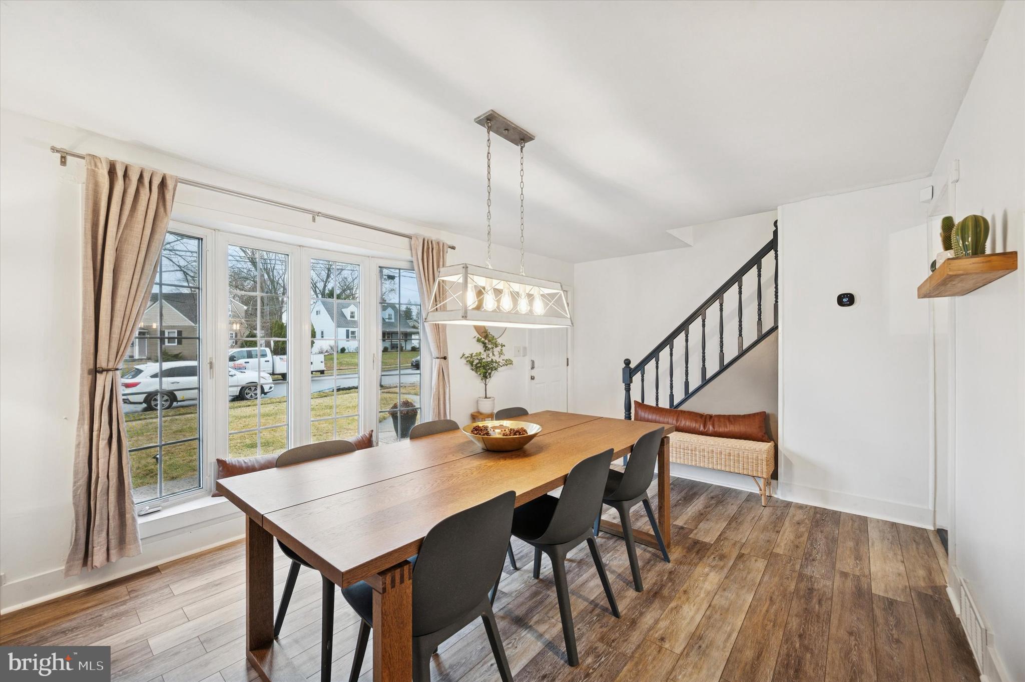 508 5th Avenue Barrington, NJ 08007 - Photo 5 of 28 a view of a dining room with furniture window and wooden floor