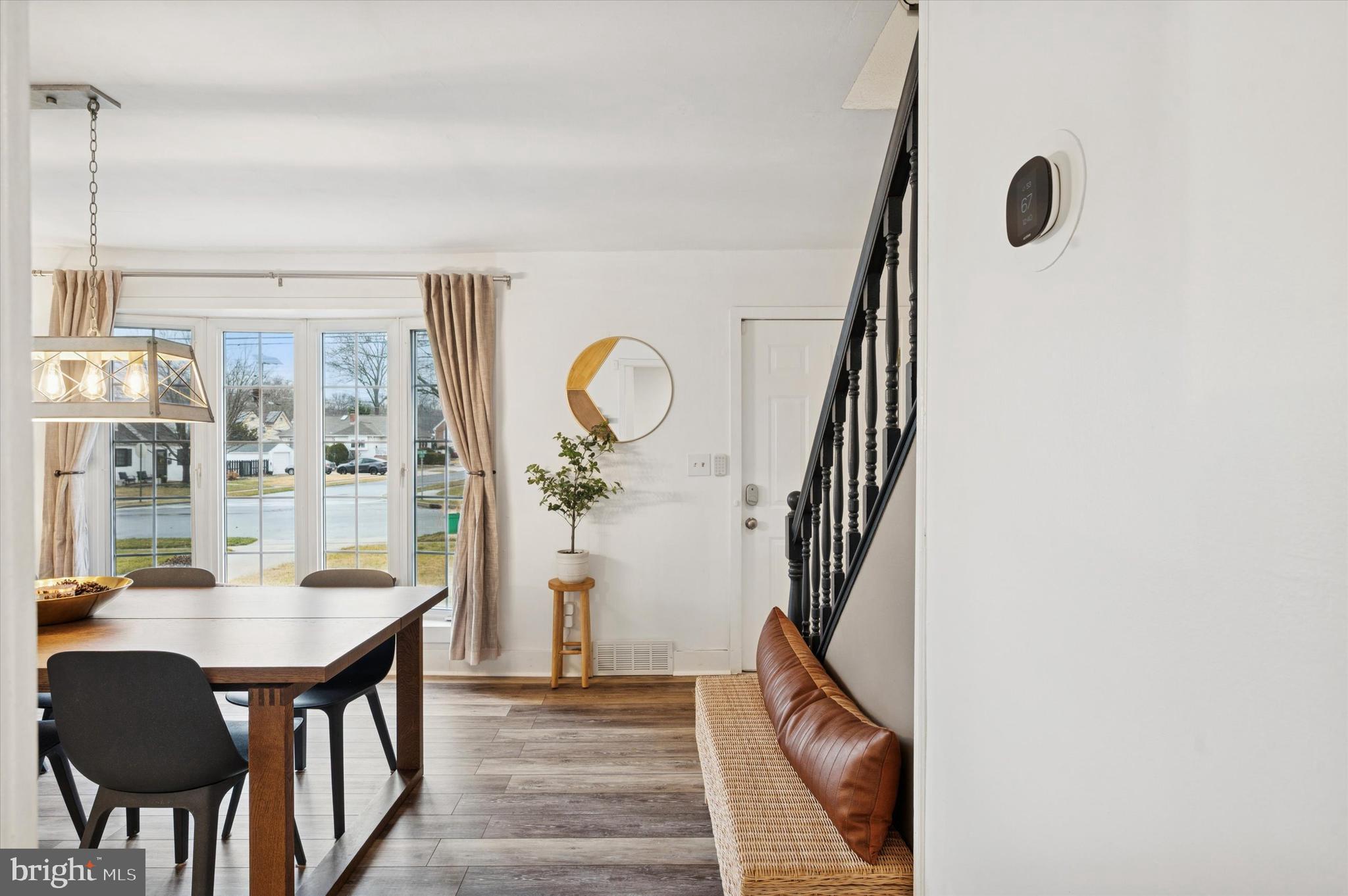 508 5th Avenue Barrington, NJ 08007 - Photo 6 of 28 a dining room with furniture and a floor to ceiling window
