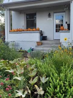 a bathroom with a granite countertop sink