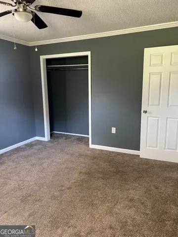 a view of a park with welcome board