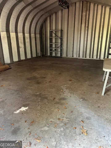 a view of a yard from a room