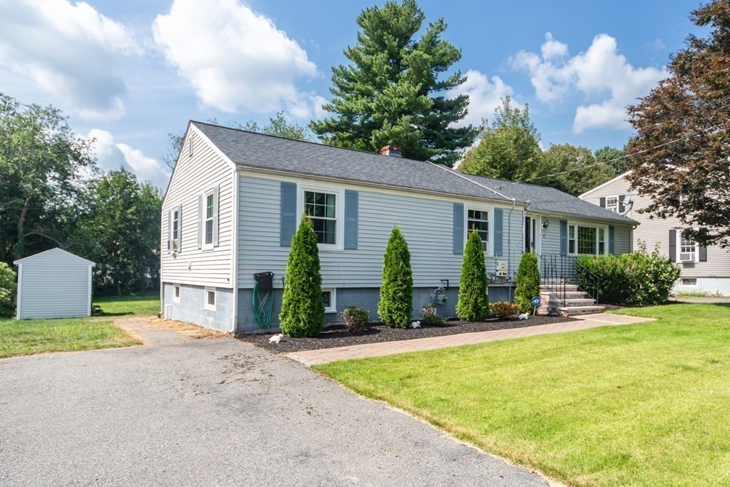 17 Lindsay Road Billerica, MA 01821 - Photo 32 of 42 a front view of house with yard and green space