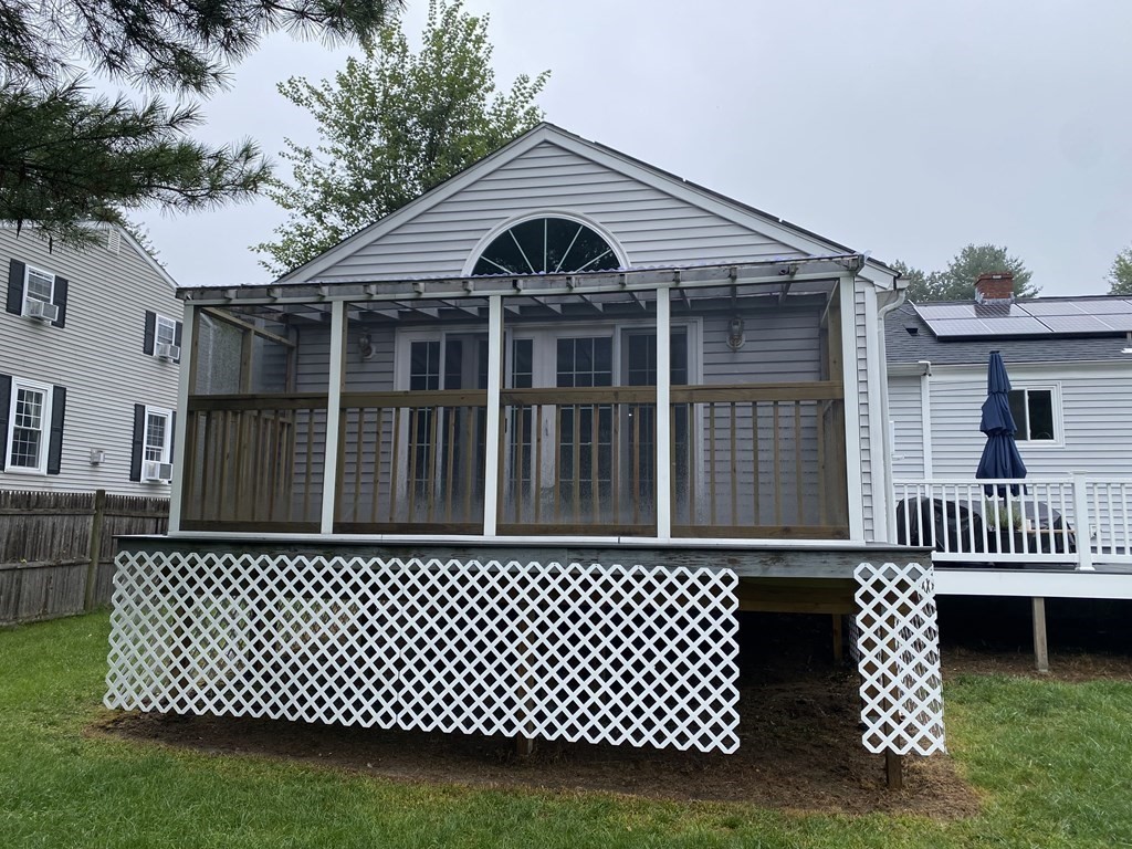 17 Lindsay Road Billerica, MA 01821 - Photo 36 of 42 a front view of a house with a garden