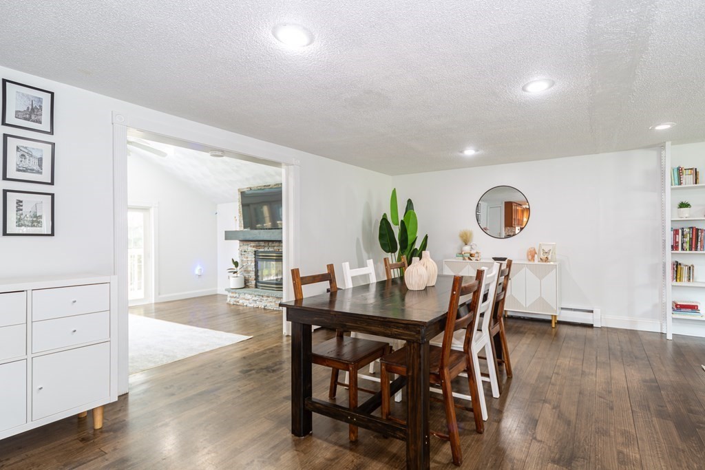 17 Lindsay Road Billerica, MA 01821 - Photo 8 of 42 a view of a dining room with furniture and wooden floor