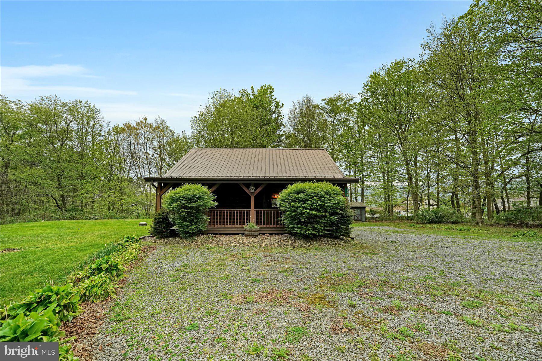 1632 Long Run Road Mill Hall, PA 17751 - Photo 2 of 33 Charming cabin nestled in nature's embrace.