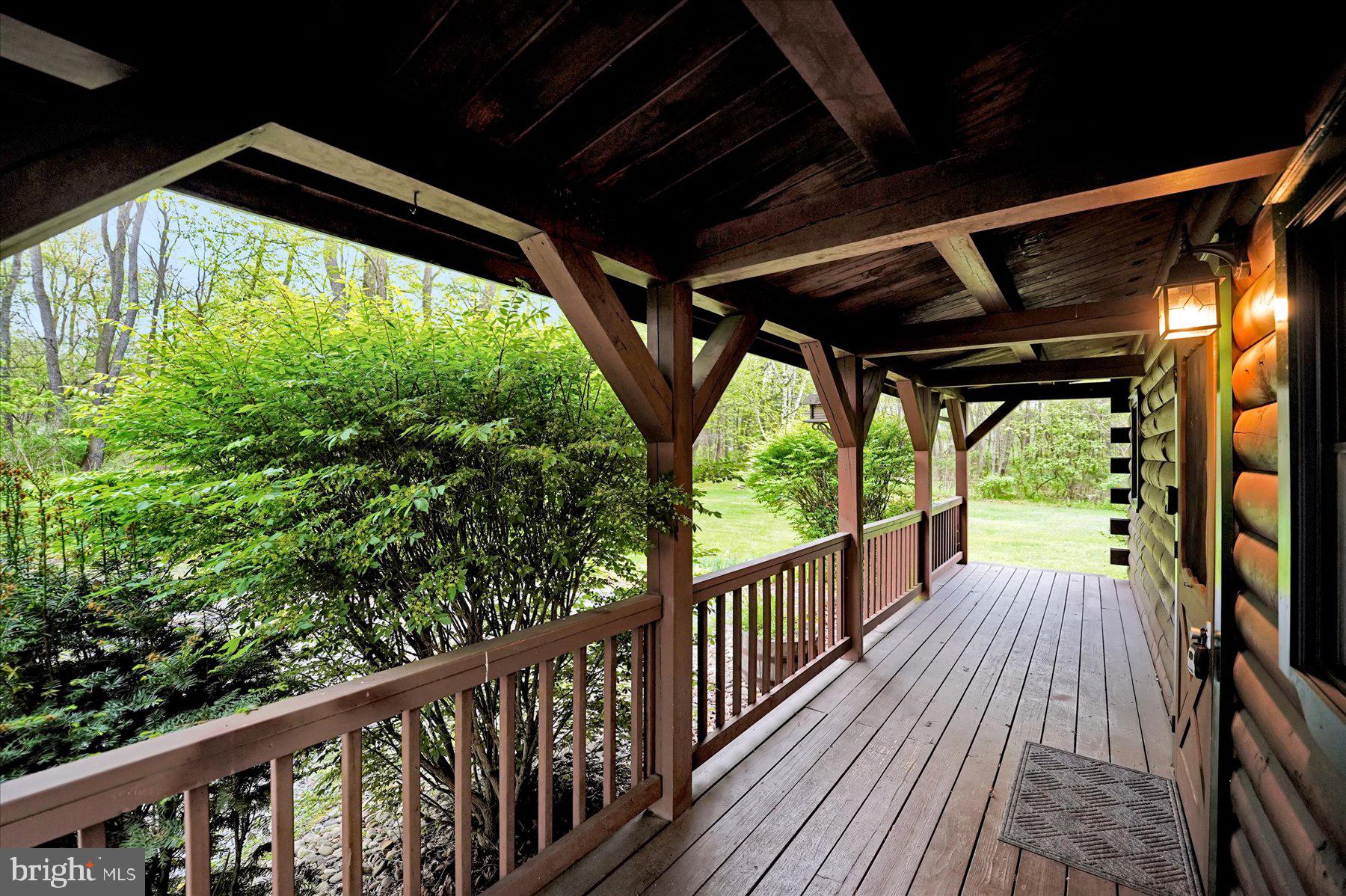 1632 Long Run Road Mill Hall, PA 17751 - Photo 3 of 33 Charming log cabin entryway