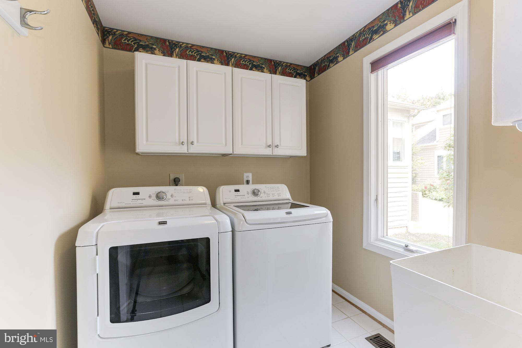1311 Pavilion Club Way Reston, VA 20194 - Photo 13 of 28 a utility room with dryer and washer