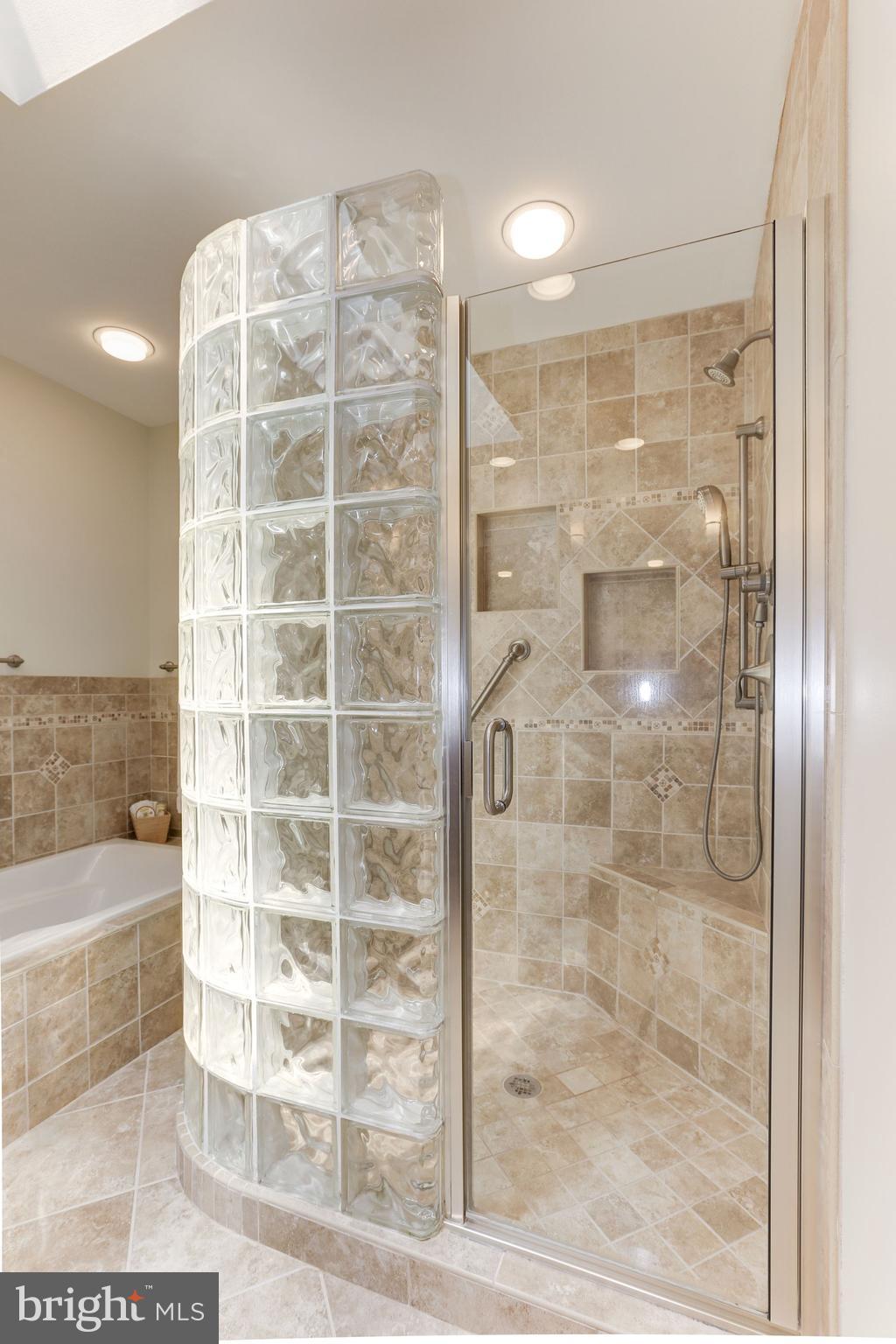 1311 Pavilion Club Way Reston, VA 20194 - Photo 17 of 28 a bathroom with a glass door shower