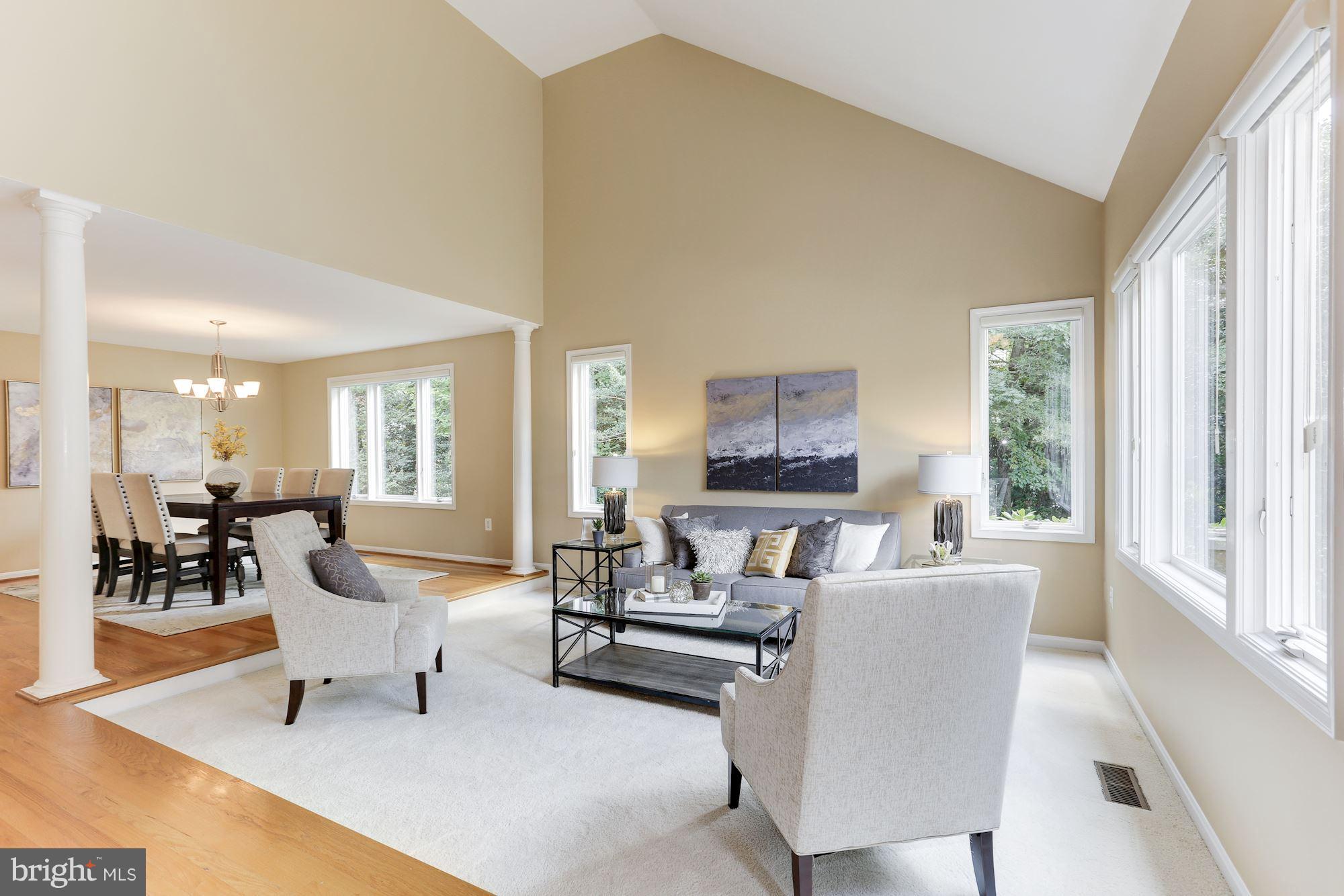 1311 Pavilion Club Way Reston, VA 20194 - Photo 3 of 28 a living room with furniture and a large window