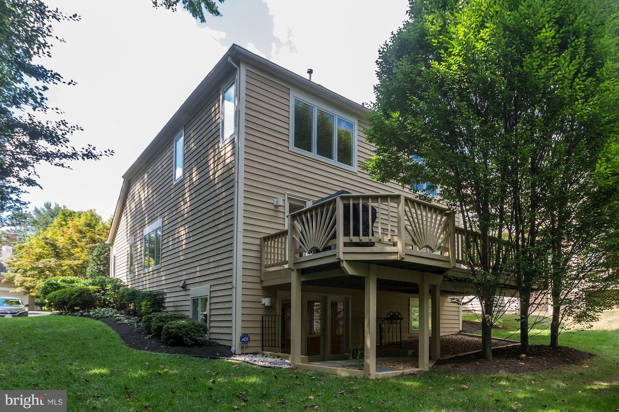 1311 Pavilion Club Way Reston, VA 20194 - Photo 28 of 28 a view of a house with a yard and sitting area