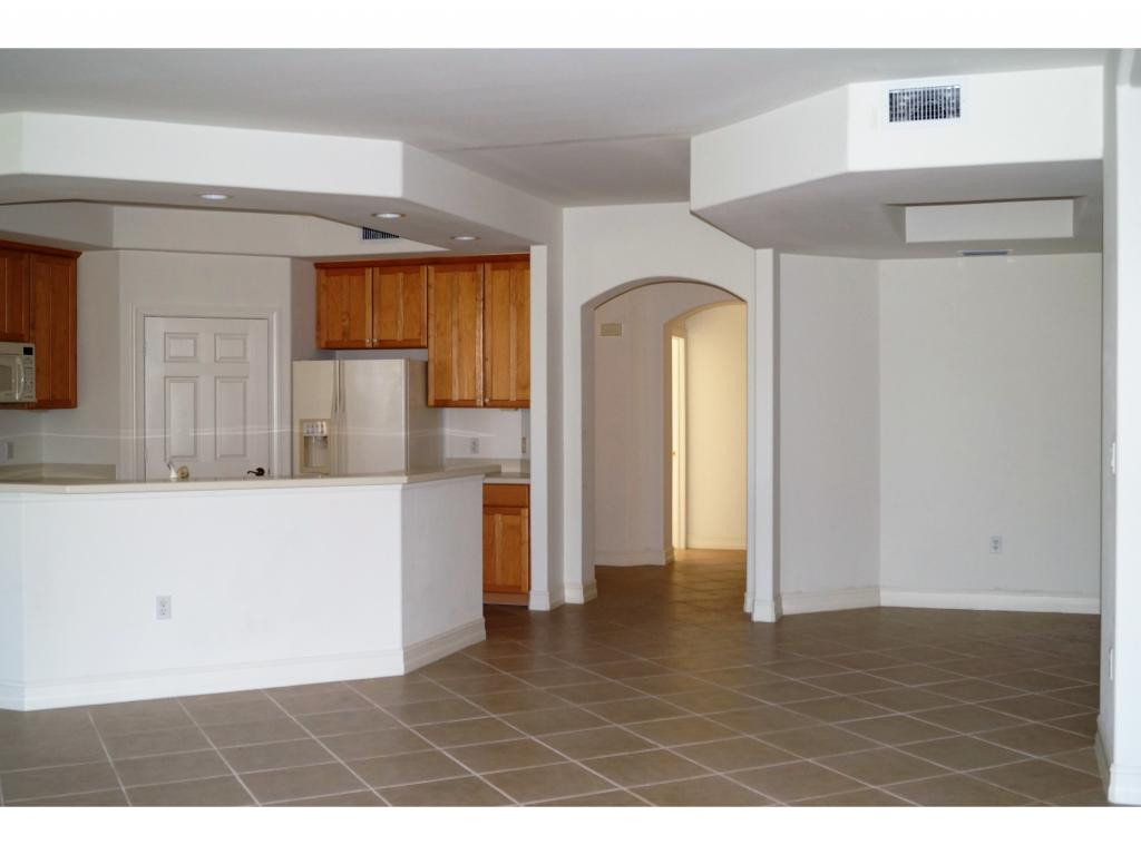 1286 Rialto Way, Unit 102 Naples, FL 34114 - Photo 2 of 17 Tray ceilingsTile