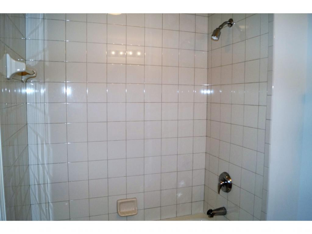 1286 Rialto Way, Unit 102 Naples, FL 34114 - Photo 13 of 17 Guest Bath
