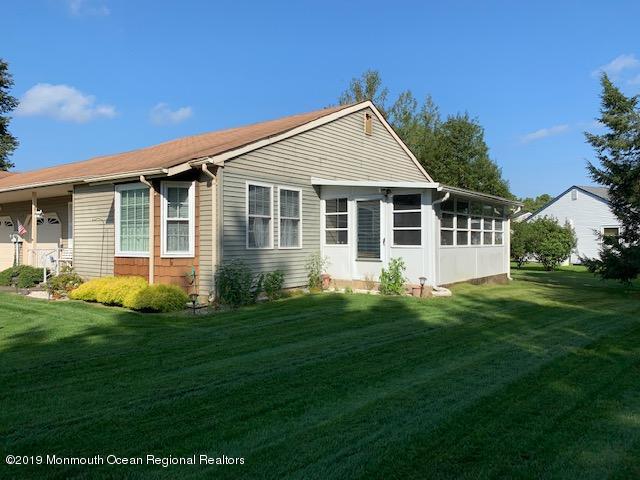 5A Mill Road, Unit C Whiting, NJ 08759 - Photo 1 of 7 a view of a house with a backyard
