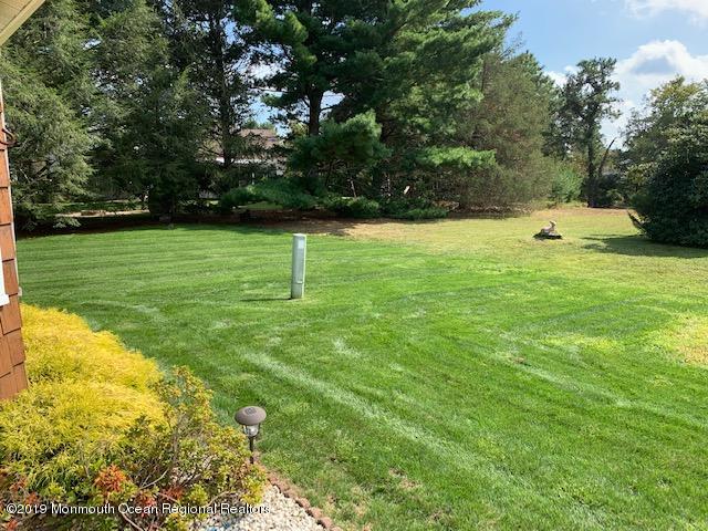 5A Mill Road, Unit C Whiting, NJ 08759 - Photo 6 of 7 a view of a tree in a yard