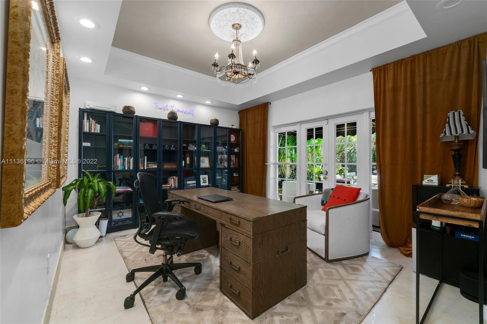 5852 Pine Tree Drive Miami Beach, FL 33140 - Photo 18 of 53 a view of a dining room with furniture window and outside view