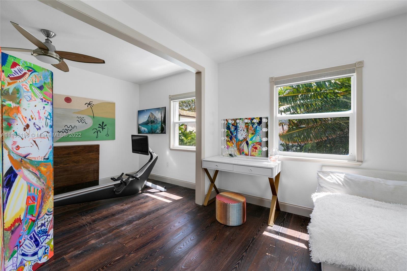 5852 Pine Tree Drive Miami Beach, FL 33140 - Photo 34 of 53 a living room with furniture and a window