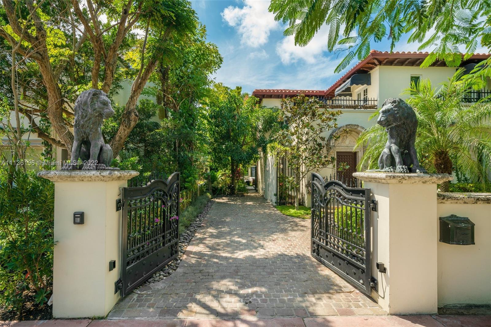 5852 Pine Tree Drive Miami Beach, FL 33140 - Photo 52 of 53 a view of a house with a trees