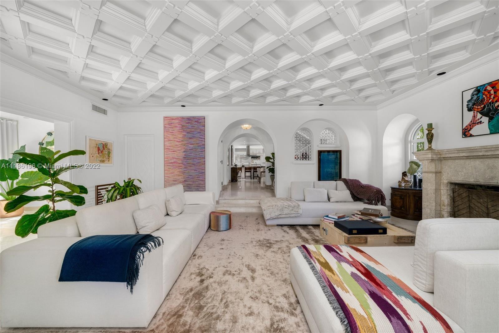 5852 Pine Tree Drive Miami Beach, FL 33140 - Photo 6 of 53 a living room with furniture and a rug