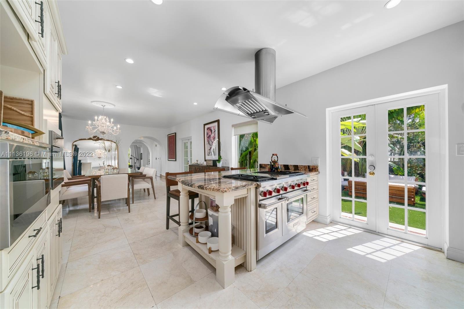 5852 Pine Tree Drive Miami Beach, FL 33140 - Photo 10 of 53 a kitchen with stove and a sink