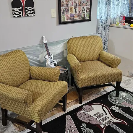 a living room with furniture and a couch