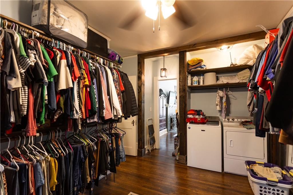 346 North Cherokee Road Social Circle, GA 30025 - Photo 26 of 71 a view of walk in closet with clothes and shoes