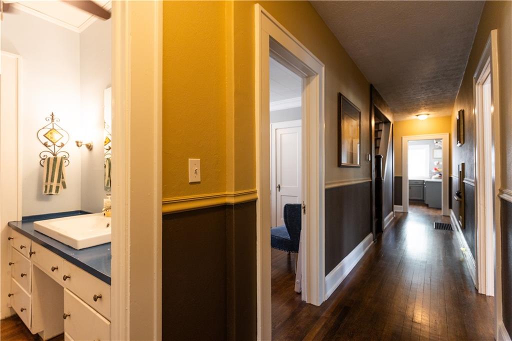 346 North Cherokee Road Social Circle, GA 30025 - Photo 29 of 71 a view of a hallway with wooden floor and a living room