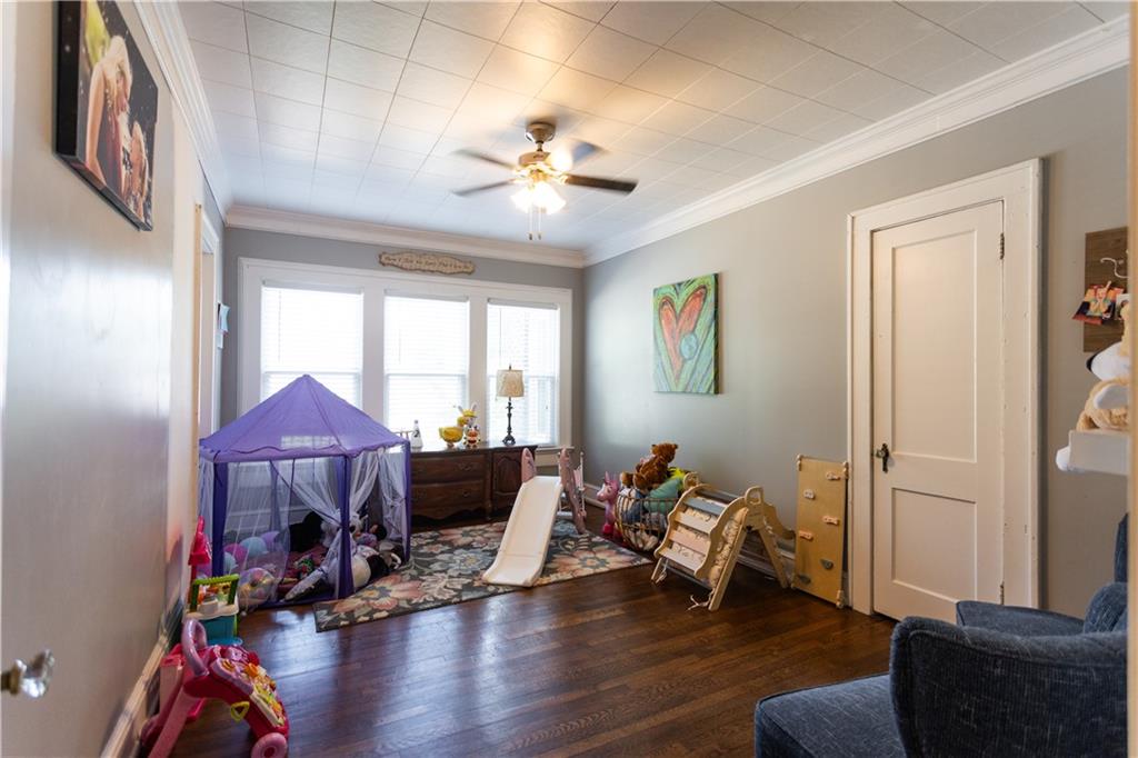 346 North Cherokee Road Social Circle, GA 30025 - Photo 31 of 71 a living room with furniture and a wooden floor