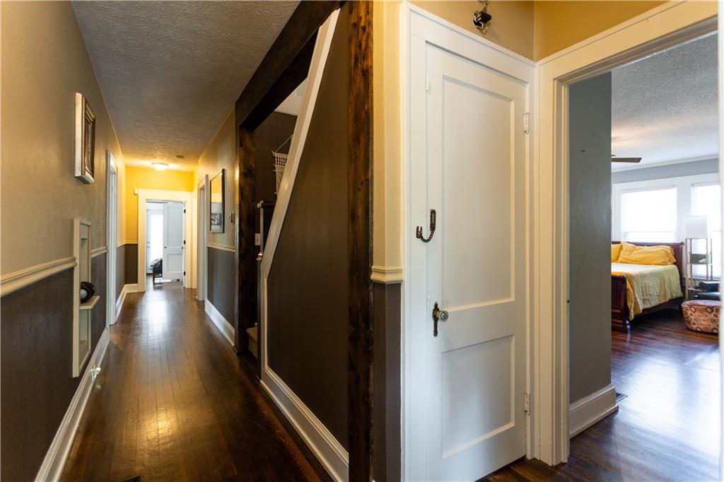 346 North Cherokee Road Social Circle, GA 30025 - Photo 34 of 71 a view of a hallway view with wooden floor and staircase