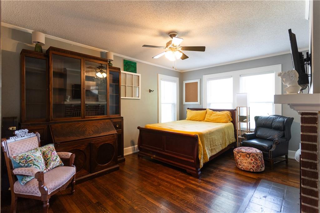 346 North Cherokee Road Social Circle, GA 30025 - Photo 35 of 71 a bedroom with a bed chairs and a window