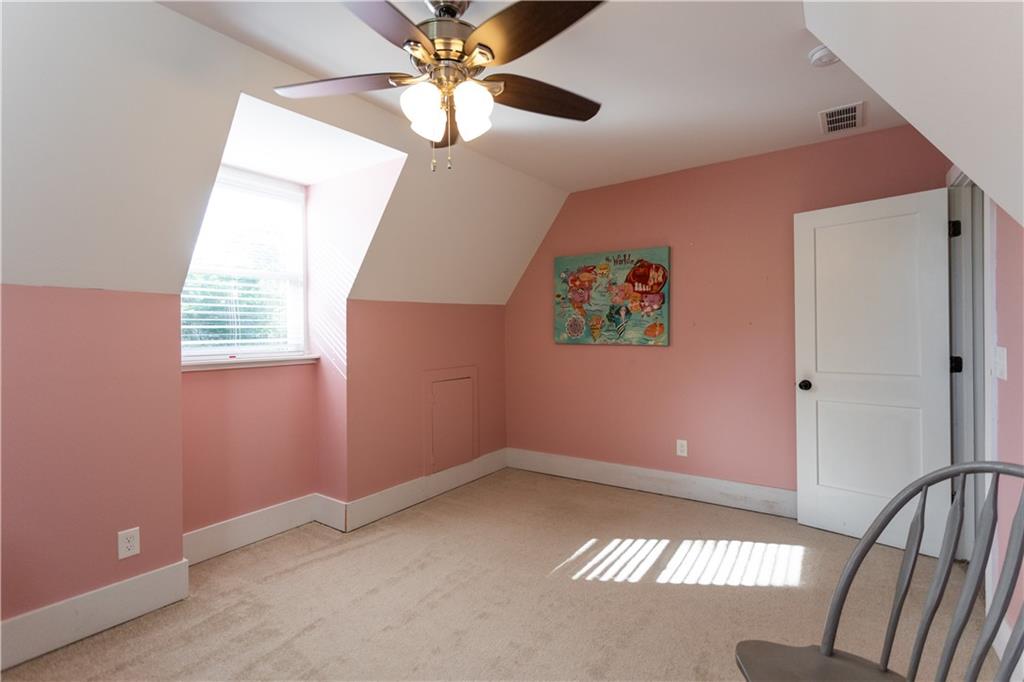 346 North Cherokee Road Social Circle, GA 30025 - Photo 43 of 71 an empty room with windows and fan