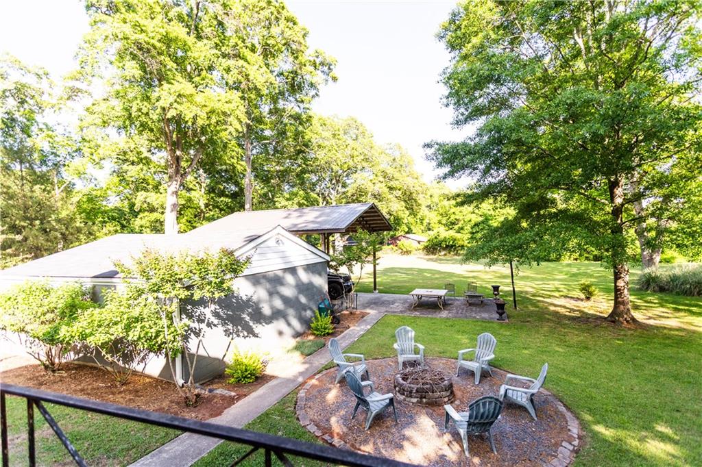 346 North Cherokee Road Social Circle, GA 30025 - Photo 55 of 71 a view of a garden with an outdoor space