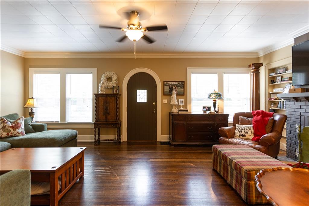 346 North Cherokee Road Social Circle, GA 30025 - Photo 9 of 71 a living room with furniture and wooden floor