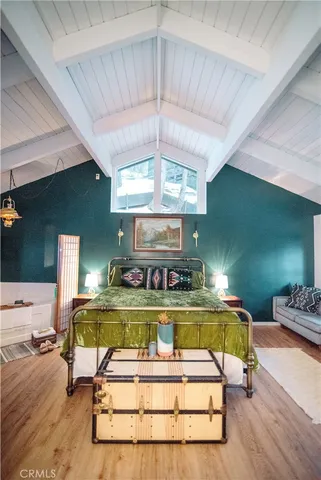 a view of a swimming pool and furniture