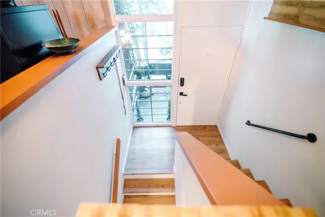 a view of balcony with wooden floor