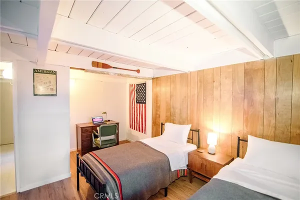 a bedroom with a bed and a closet