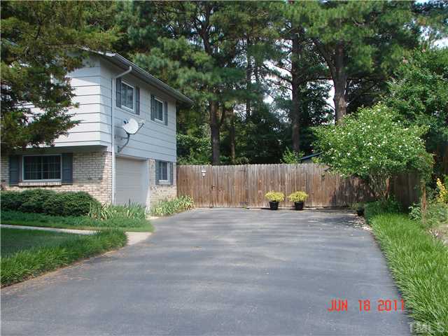2113 Jordan Cabin Road Wendell, NC 27591 - Photo 2 of 20 Paved drive and side entrance garage