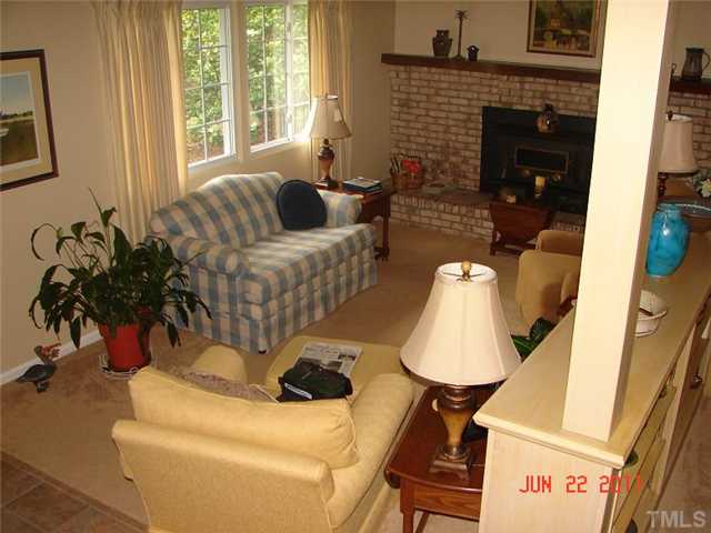 2113 Jordan Cabin Road Wendell, NC 27591 - Photo 9 of 20 Living room from stairs...all new vinyl windows throughout