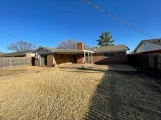 5435 42nd Street Lubbock, TX 79414 - Photo 12 of 12 a front view of a house with a yard