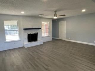 5435 42nd Street Lubbock, TX 79414 - Photo 4 of 12 an empty room with windows and fireplace