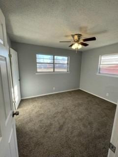 5435 42nd Street Lubbock, TX 79414 - Photo 6 of 12 an empty room with windows and fan