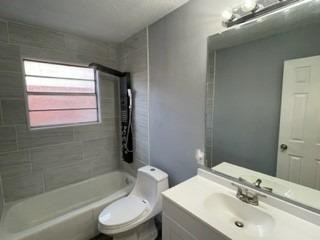 5435 42nd Street Lubbock, TX 79414 - Photo 7 of 12 a bathroom with a sink toilet and shower