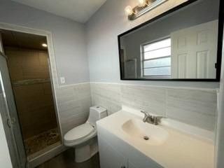 5435 42nd Street Lubbock, TX 79414 - Photo 10 of 12 a bathroom with a sink toilet and shower