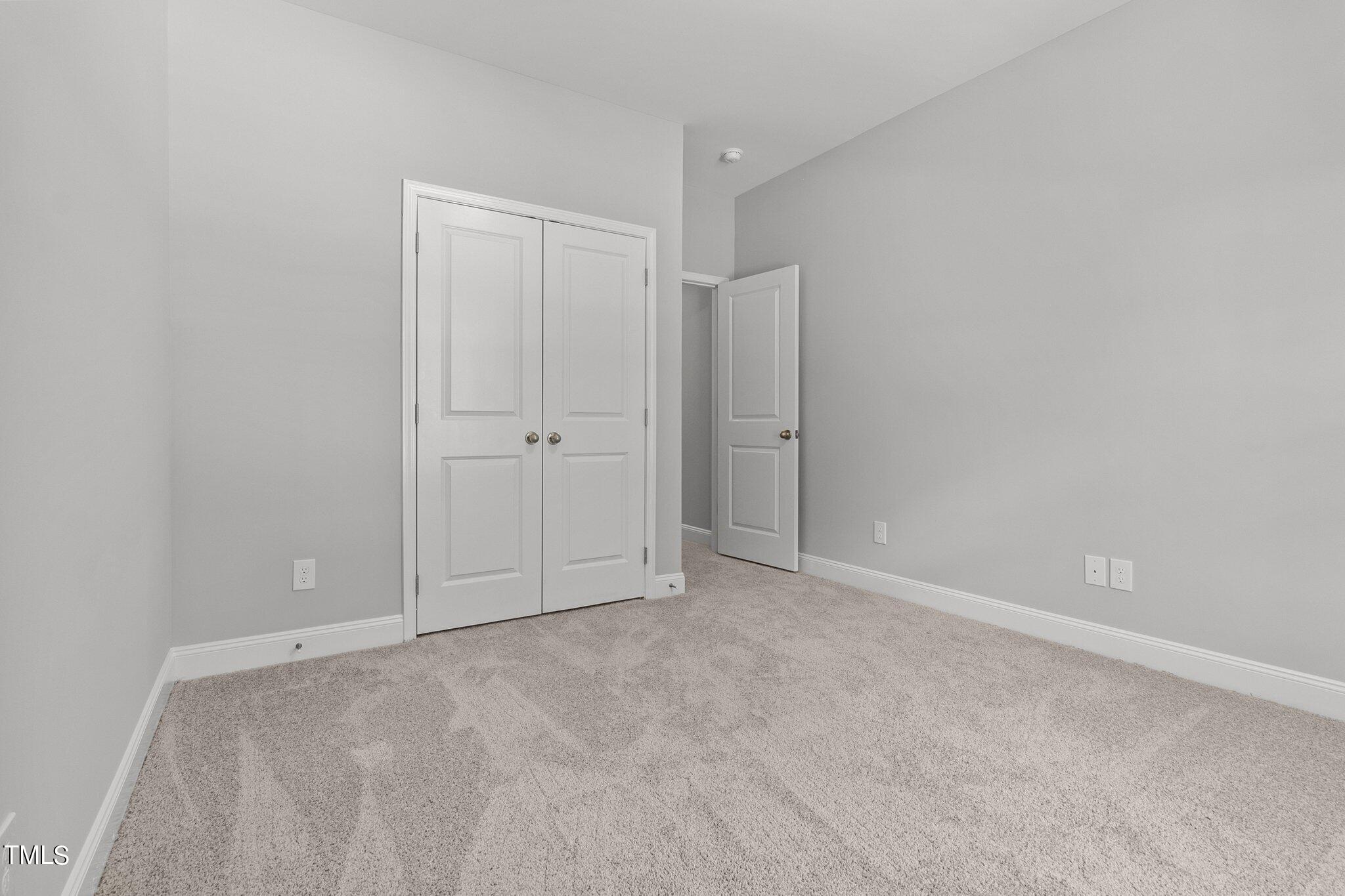 57 Regis Lane Coats, NC 27521 - Photo 20 of 39 a view of an empty room