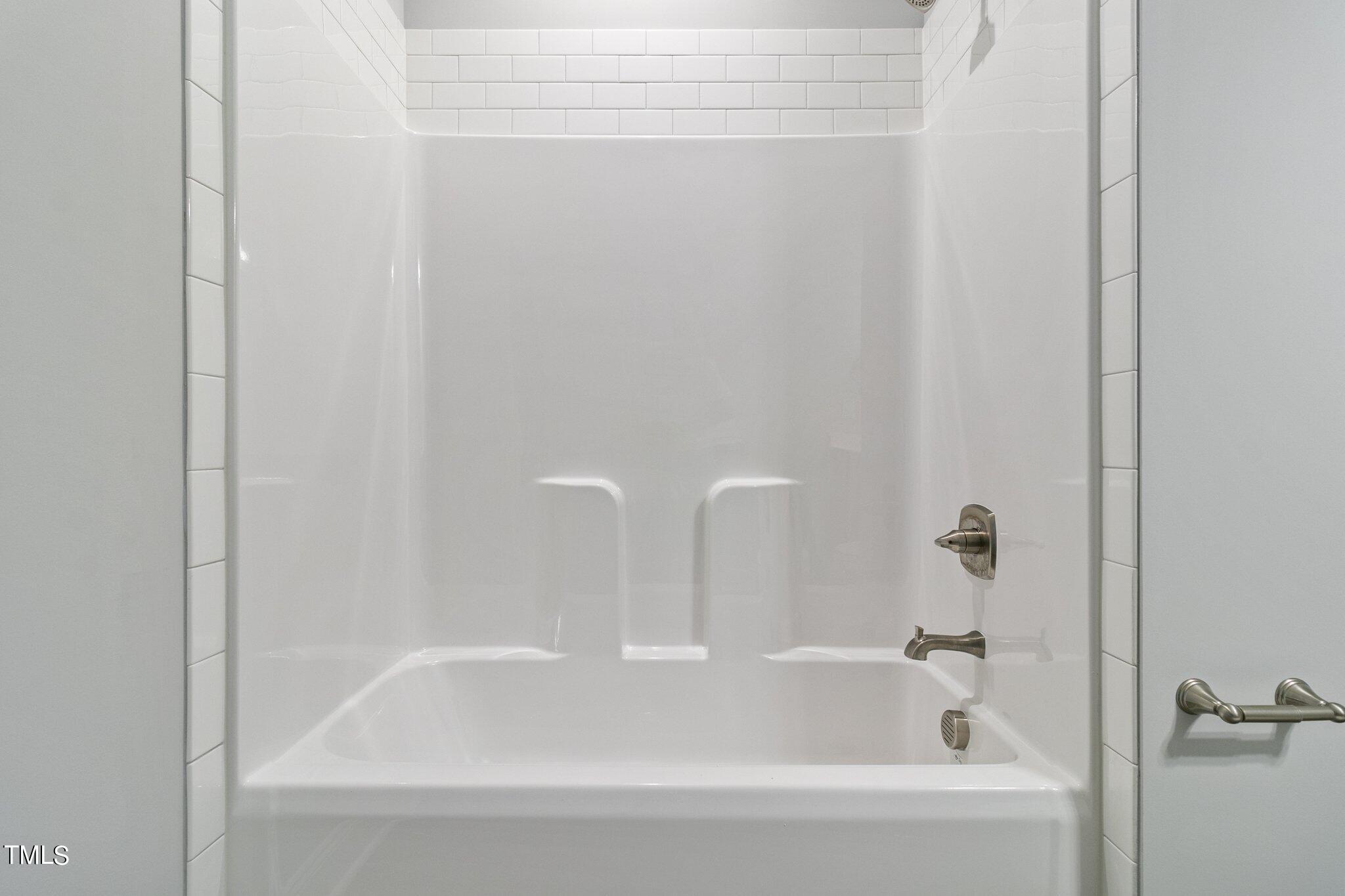 57 Regis Lane Coats, NC 27521 - Photo 28 of 39 a close up of a bathtub