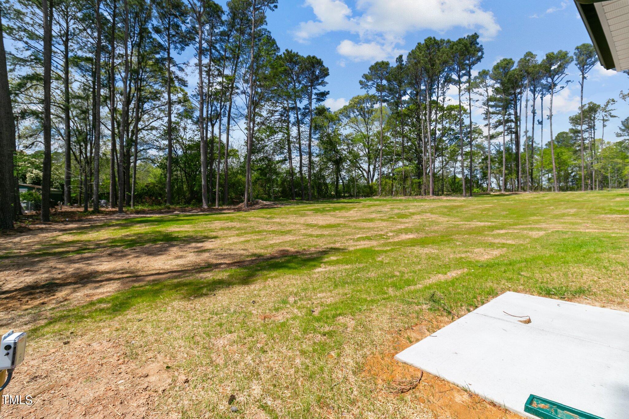 57 Regis Lane Coats, NC 27521 - Photo 29 of 39 a view of a tennis court
