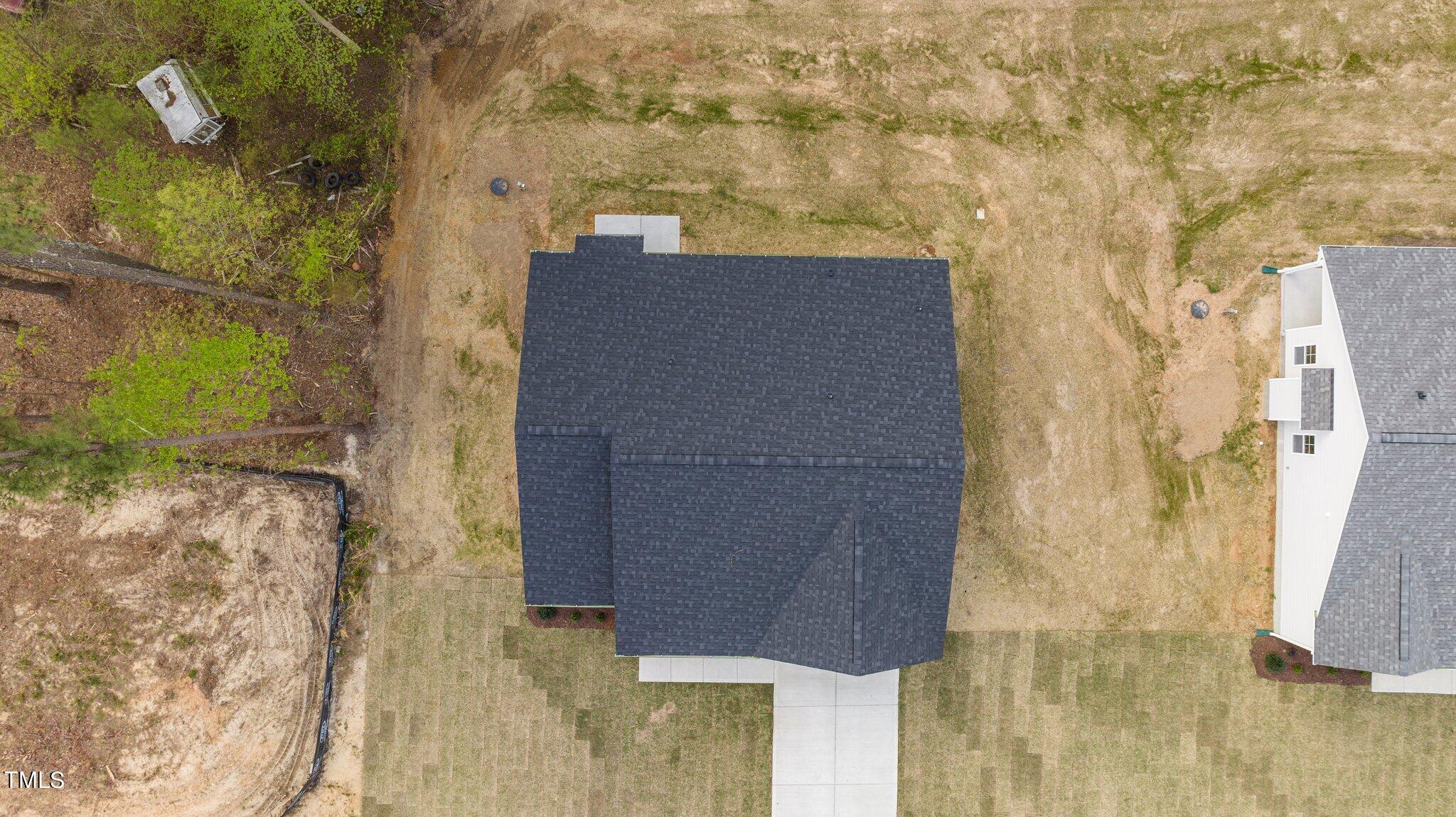 57 Regis Lane Coats, NC 27521 - Photo 33 of 39 a bathroom with a shower