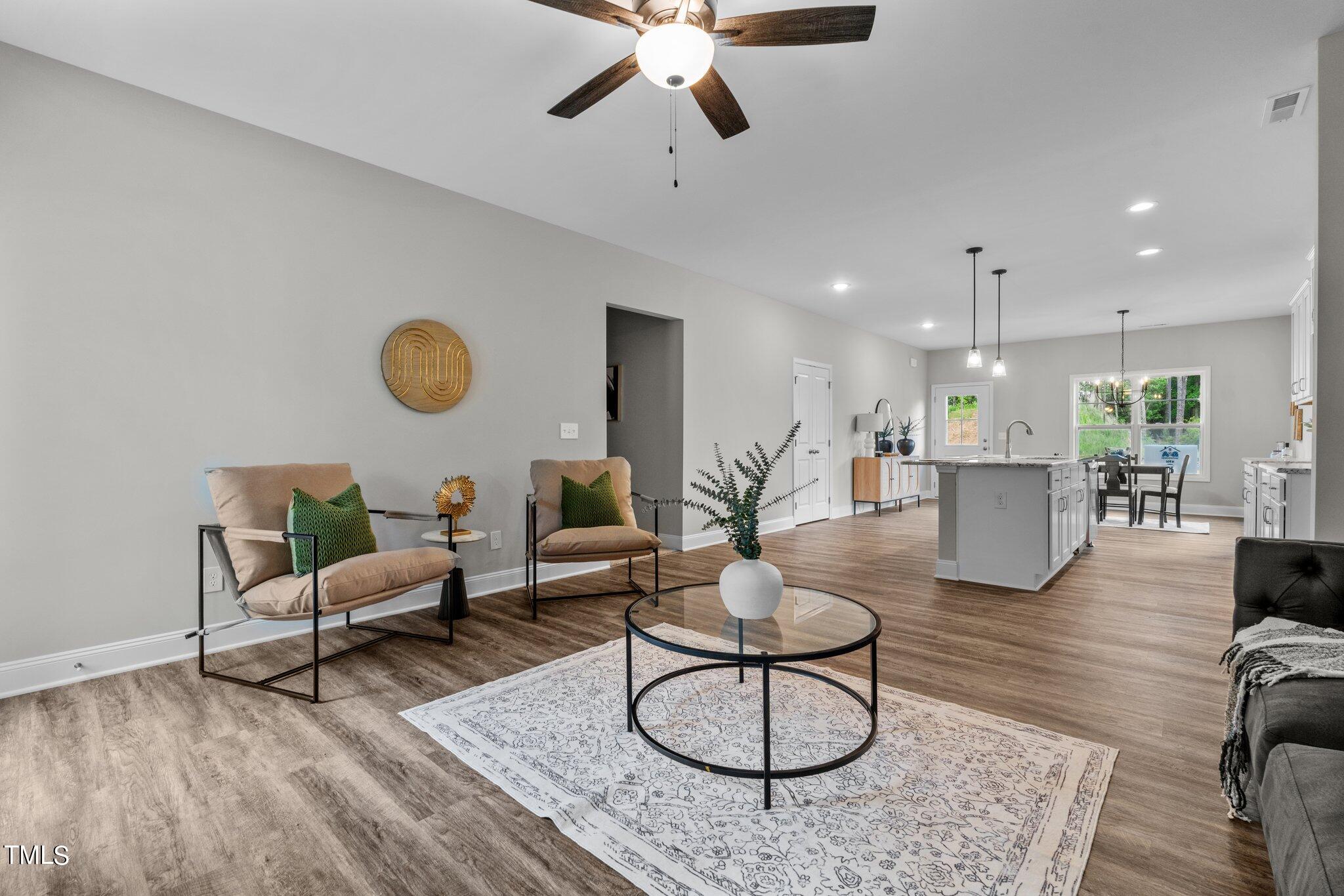 57 Regis Lane Coats, NC 27521 - Photo 7 of 39 a living room with furniture and kitchen view
