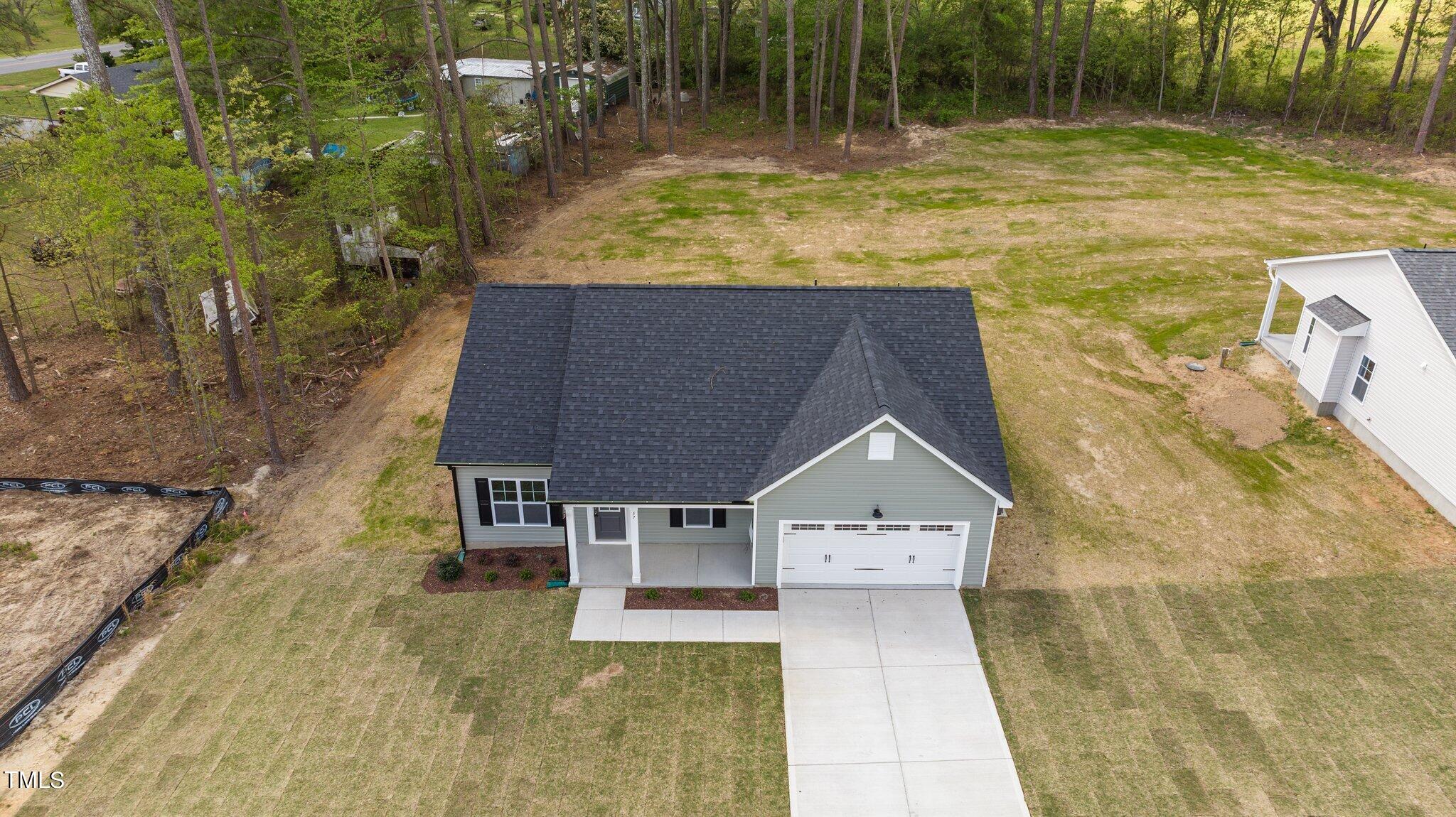 57 Regis Lane Coats, NC 27521 - Photo 10 of 39 swimming pool view with a outdoor seating