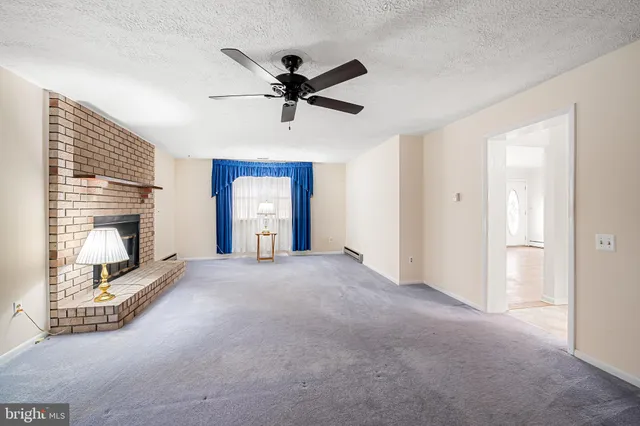 a view of a livingroom with a fireplace